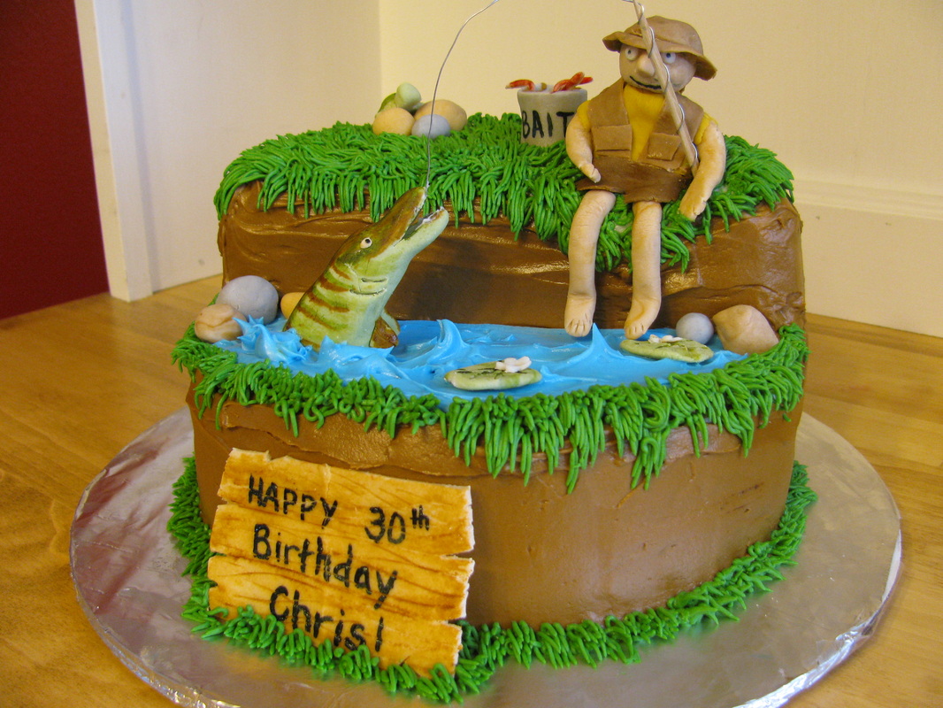 Fish Themed Birthday Cake Iced With Fondant With A Sculpted 3D Fish